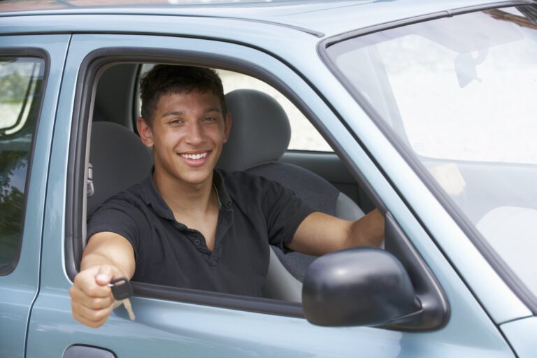 Picture showing a happy man who has passed his driving test